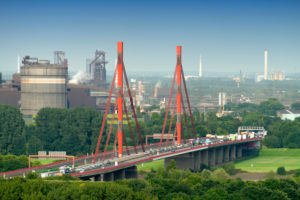 View from the dump Rheinpreußen on the highway bridge A 42 and Thyssenkrupp Steel Europe AG in Duisburg, Moers, North Rhine-Westphalia, Germany View from the dump Rheinpreußen on the highway bridge A 42 and Thyssenkrupp Steel Europe AG in Duisburg, Moers, North Rhine-Westphalia, Germany